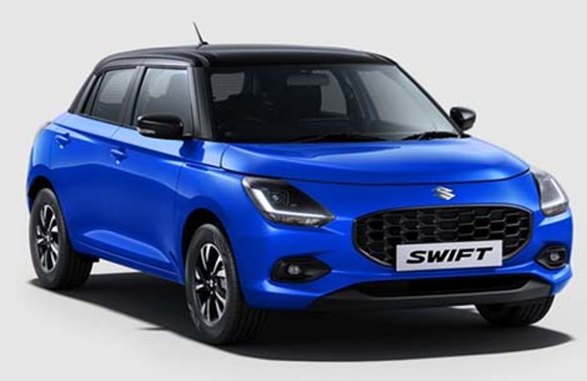 All New Suzuki Swift parked in front of a car dealership in Thane